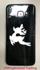 Leaping Christmas reindeer silhouette vinyl decal with antlers displayed on truck window for holiday decorating