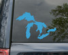 White Great Lakes map silhouette vinyl decal showing Lake Superior, Michigan, Huron, Erie and Ontario in geographic arrangement on a dark vehicle window