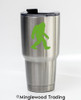 Walking Bigfoot Sasquatch silhouette vinyl decal featuring a shaggy cryptid with long arms and large feet on a vehicle window