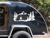 Bigfoot Sasquatch walking through mountain forest scene with evergreen pine trees and rugged peaks vinyl decal for RV camper and travel trailer