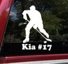 Personalized ice hockey player silhouette vinyl decal with hockey stick, puck and custom name beneath the design, available in nine sizes from 3 x 4.5 inches to 20 x 30 inches with mirror option and 12-character name personalization