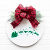  Christmas vinyl window decal featuring Santa Claus in a gift-filled sleigh pulled by four running and jumping cats surrounded by stars and paw prints