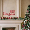 Merry Christmas vinyl window decal featuring tall uppercase MERRY lettering above flowing cursive Christmas script with decorative flourishes