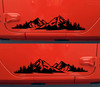 mirrored mountain vinyl decal pair featuring rugged mountain peaks and evergreen forests for trucks campers rvs overland vehicles and adventure rigs