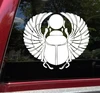 Egyptian winged scarab beetle vinyl decal with spread feathered wings and sun disk inspired by ancient Egyptian mythology and sacred scarab symbolism
