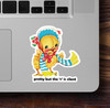 Small sarcastic vinyl sticker with text “Pretty But The R Is Silent” placed beside laptop trackpad, ideal for creative spaces