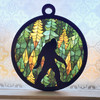Bigfoot 5.5 inch round suncatcher with pine trees forest design on acrylic MDF

