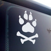 Dog Wolf Paw and Crossed Bones vinyl decal featuring a stylized paw print over crossed bones, symbolizing loyalty and wild strength