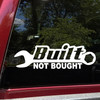 Built Not Bought wrench vinyl decal showing bold automotive lettering with a classic hand tool symbol in solid black on a white background