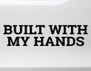 Built With My Hands vinyl decal featuring bold lettering celebrating maker pride and hands-on workshop craftsmanship on a white background