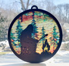 Bigfoot campfire round MDF suncatcher with pine tree forest and jute hanger cord
