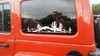 Desert cactus mesa scene vinyl sticker decal applied to RV travel trailer window with southwest landscape design