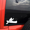bigfoot sasquatch paddling canoe vinyl sticker decal applied to car window showing outdoor lake adventure silhouette