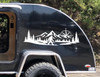 bigfoot sasquatch compass mountain forest vinyl sticker decal applied to rv window showing wilderness adventure silhouette design