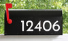 Josefin Sans vinyl mailbox numbers applied to modern residential mailbox with retro mid century typography