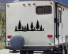 bigfoot sasquatch middle finger vinyl sticker decal with pine forest silhouette applied to rv camper rear window outdoors scene