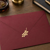 berry sprig vinyl envelope seal sticker decal applied to invitation flap with botanical greenery styling