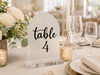 wedding table number vinyl decal set displayed in elegant script style for reception seating arrangements and event decor