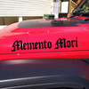 memento mori vinyl sticker decal featuring classic roman serif typography and latin stoic philosophy phrase promoting purposeful living