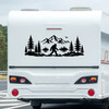 bigfoot mountain lake forest vinyl decal featuring sasquatch walking through pine trees beside a lake with mountain peaks for rvs campers travel trailers trucks and overland vehicles