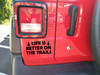 life is better on the trails vinyl decal featuring pine trees and bold lettering designed for trucks, suvs, campers, overland rigs, and outdoor adventure vehicles