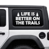 life is better on the trails vinyl decal featuring pine trees and bold lettering designed for trucks, suvs, campers, overland rigs, and outdoor adventure vehicles