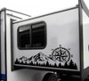 Mountain Compass Rose Forest vinyl decal featuring rugged mountain peaks, evergreen trees, and a compass rose for trucks, RVs, campers, travel trailers, SUVs, and overland vehicles.