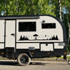 Mirrored Bigfoot UFO abduction forest vinyl decal pair with pine trees moon and stars for truck RV camper and motorhome sides