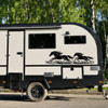 Galloping horses vinyl decal with two running horses and flowing prairie grass for truck RV camper motorhome SUV and horse trailer graphics