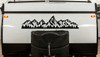 Grand Tetons vinyl decal with rugged mountain peaks and evergreen pine forest displayed on an RV camper exterior panel