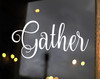 Gather vinyl decal in decorative Nouradilla script font for kitchen dining room family gathering wall decor
