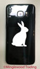 Rabbit silhouette vinyl decal featuring a seated bunny side profile with long upright ears and small tail