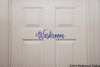 Washroom vinyl decal featuring elegant flowing cursive script lettering for bathroom doors, restroom entrances, powder rooms and mirrors, available in nine sizes from a 2-pack of 5 x 1.5 inches to 30 x 9 inches