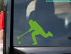 Broomball player silhouette vinyl decal showing an athlete running with a broomball stick and ball, available in nine sizes from a 4-pack of 2.5 x 1.75 inches to 30 x 21 inches with mirror option