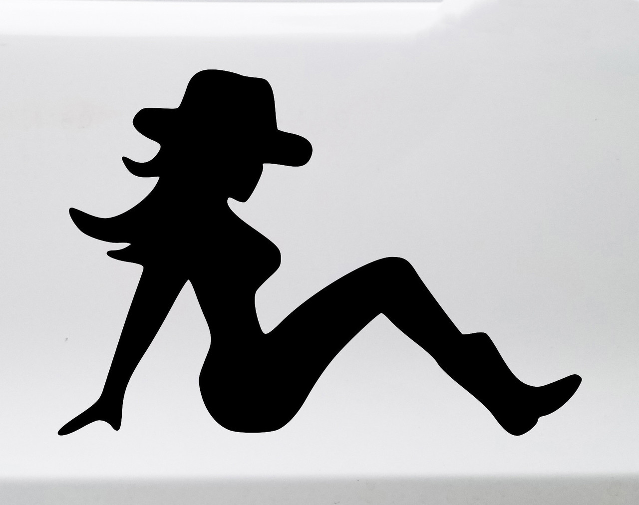 Mudflap Cowgirl vinyl decal featuring a reclining Western woman silhouette with cowboy hat
