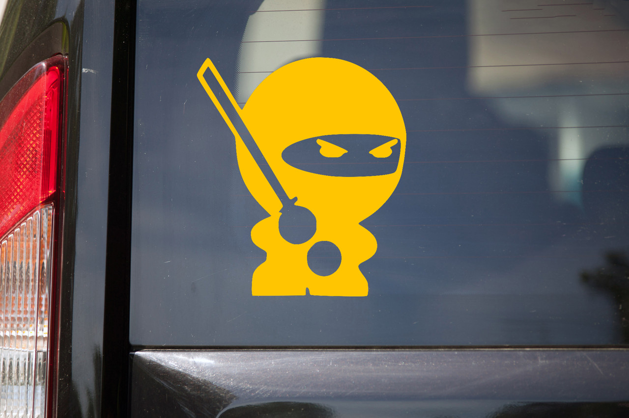 Ninja vinyl decal featuring a masked martial arts warrior holding a sword