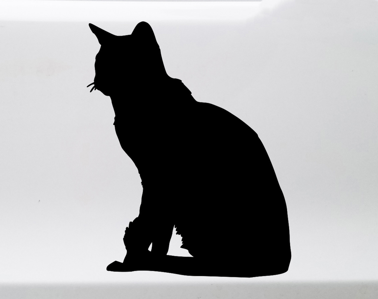 Sitting cat vinyl decal featuring realistic side profile feline silhouette