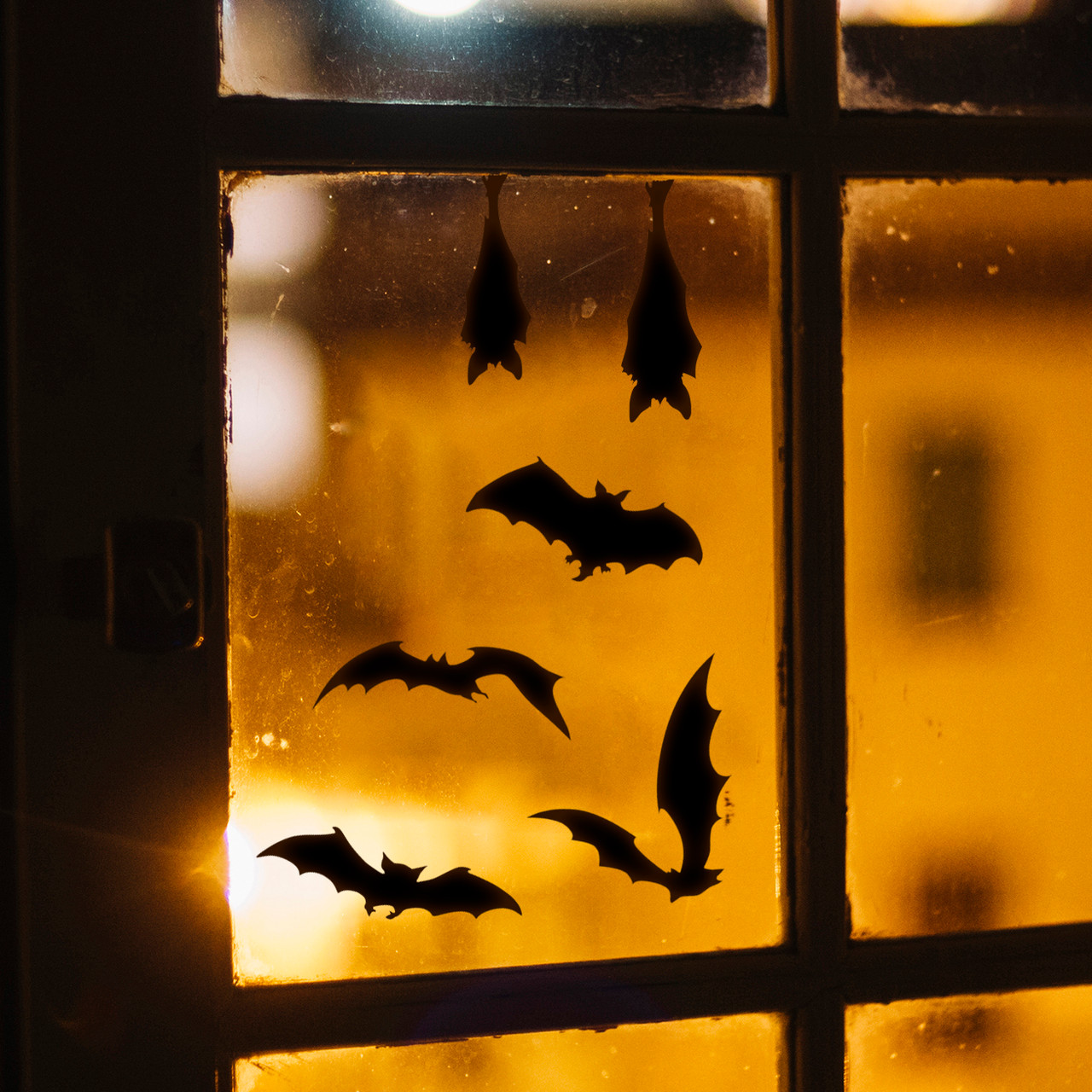 Halloween bat vinyl decals displayed on a window - ideal Halloween window decoration