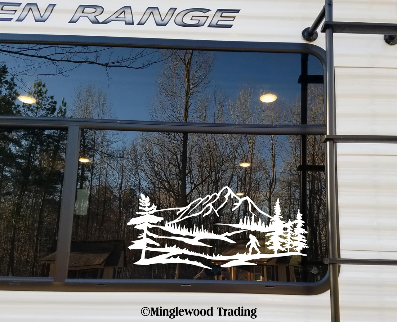 Bigfoot Sasquatch mountain landscape vinyl decal V2 featuring walking cryptid silhouette, mountain peaks, evergreen forest and pine trees for RV campers and travel trailers