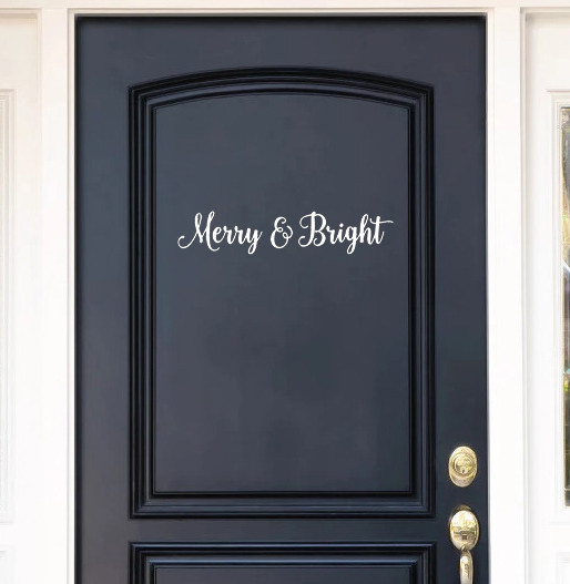 Merry and Bright Christmas horizontal script lettering vinyl decal displayed on front door for holiday decorating