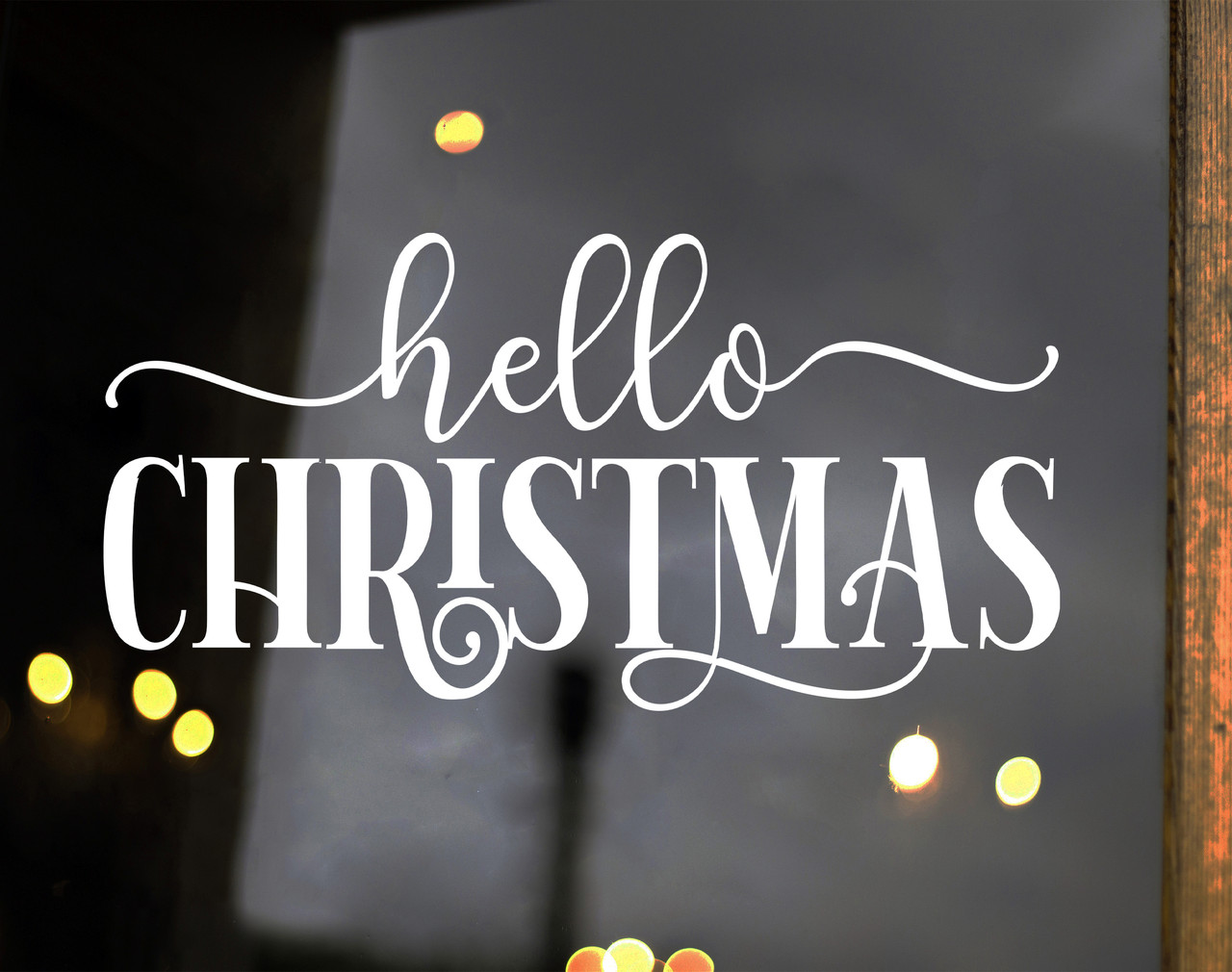 Hello Christmas vinyl decal on a window - weather-resistant and perfect Christmas window decal for holiday decor