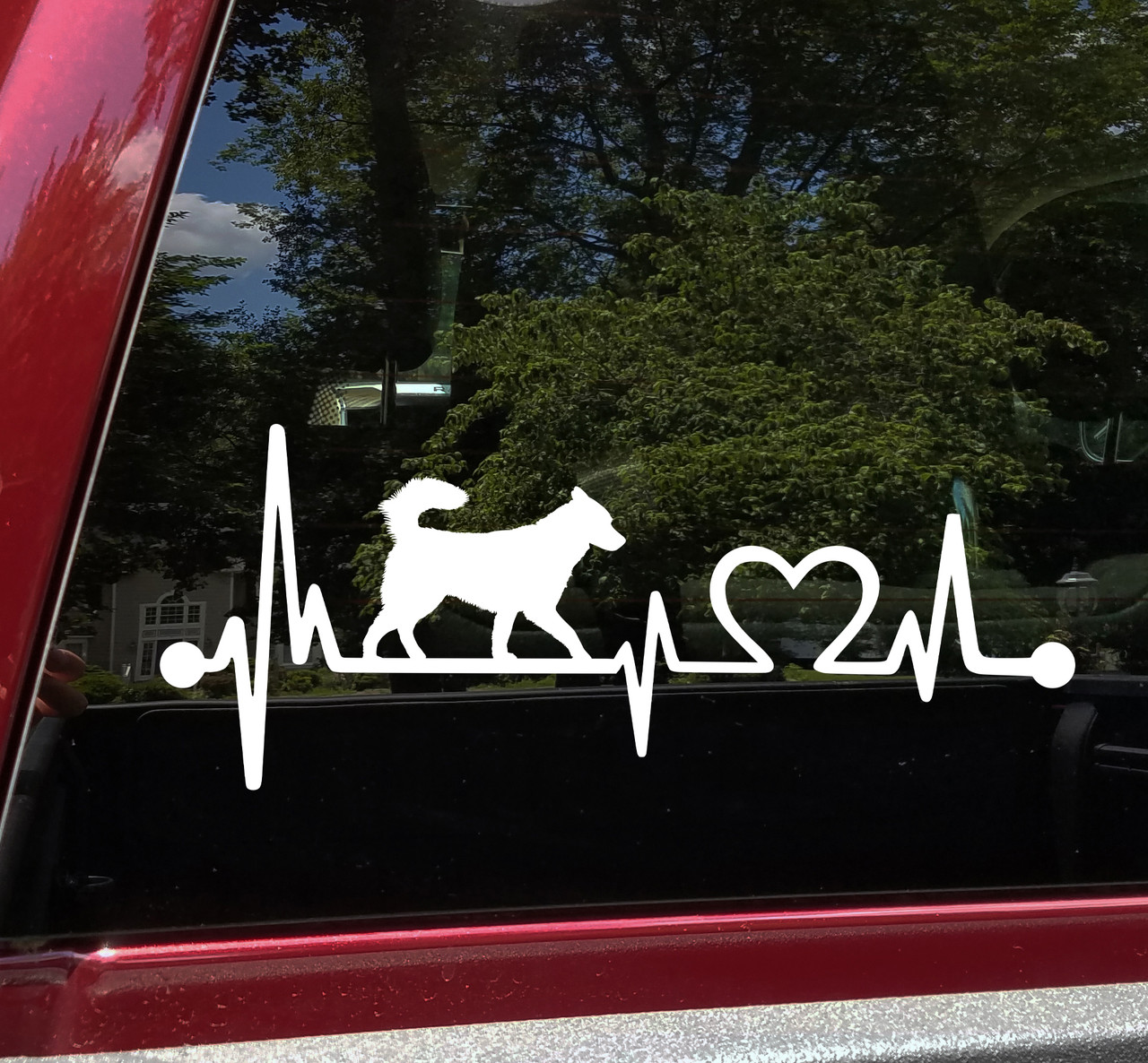 Husky Love Heartbeat vinyl decal featuring a Siberian Husky dog silhouette with EKG pulse line and heart symbol, available in nine sizes with mirror option