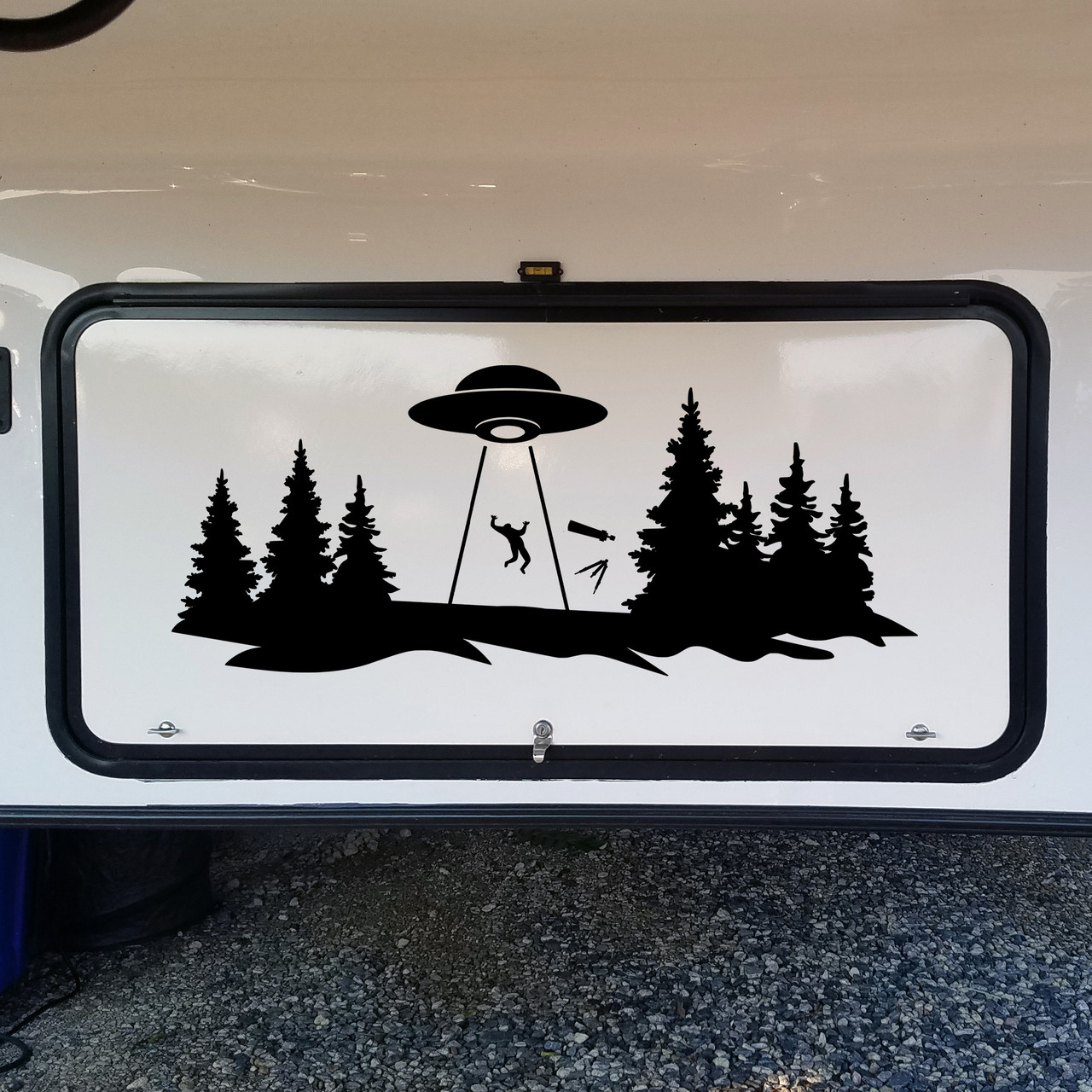 UFO abduction vinyl decal with telescope and trees in silhouette landscape