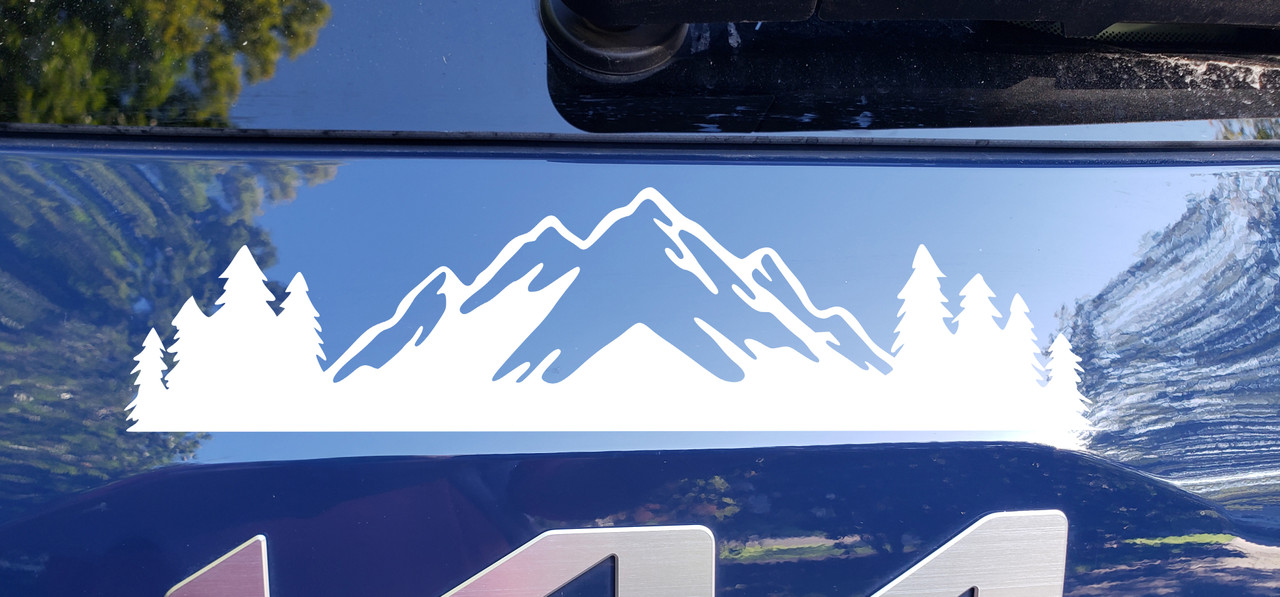 Mountains and trees vinyl decal for cars, trucks, and SUVs – fits above vehicle name badge