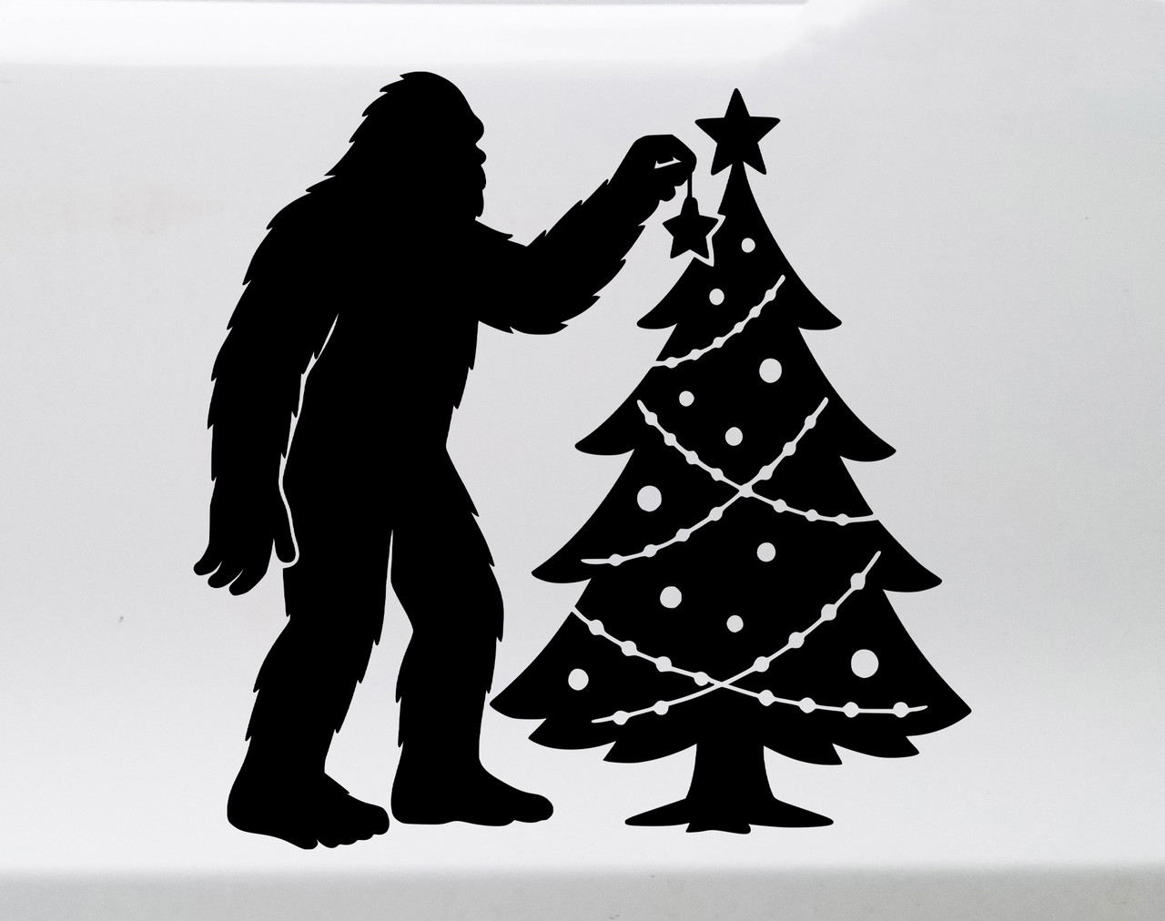 Bigfoot Decorating Christmas Tree Vinyl Decal Sticker – Sasquatch Holiday – Funny Christmas Car Window Art