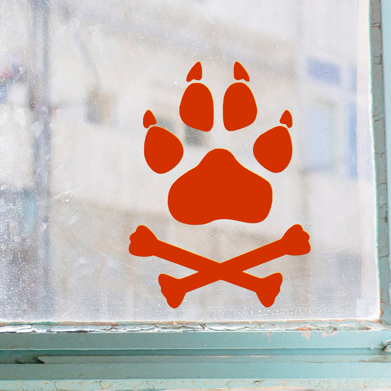 Dog Wolf Paw and Crossed Bones vinyl decal featuring a stylized paw print over crossed bones, symbolizing loyalty and wild strength