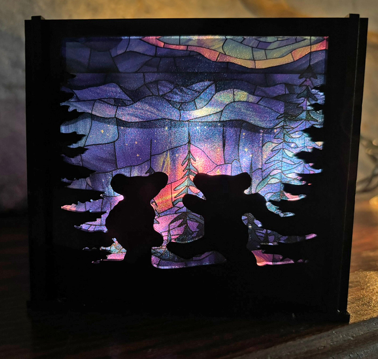 Moondance luminary SVG with dancing bears and turtles in a circular laser cut lantern design