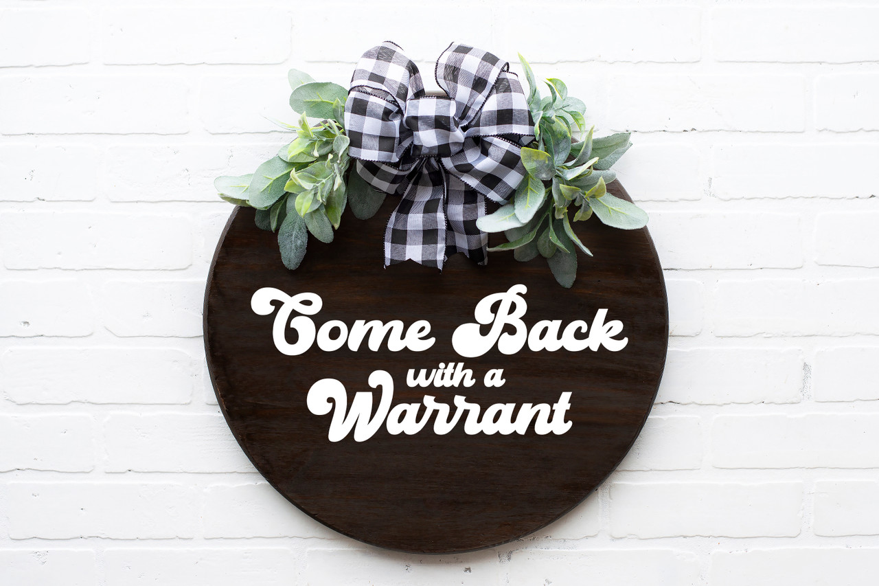 Come Back With A Warrant vinyl decal showing bold black text lettering in a clean, high-contrast design on white background