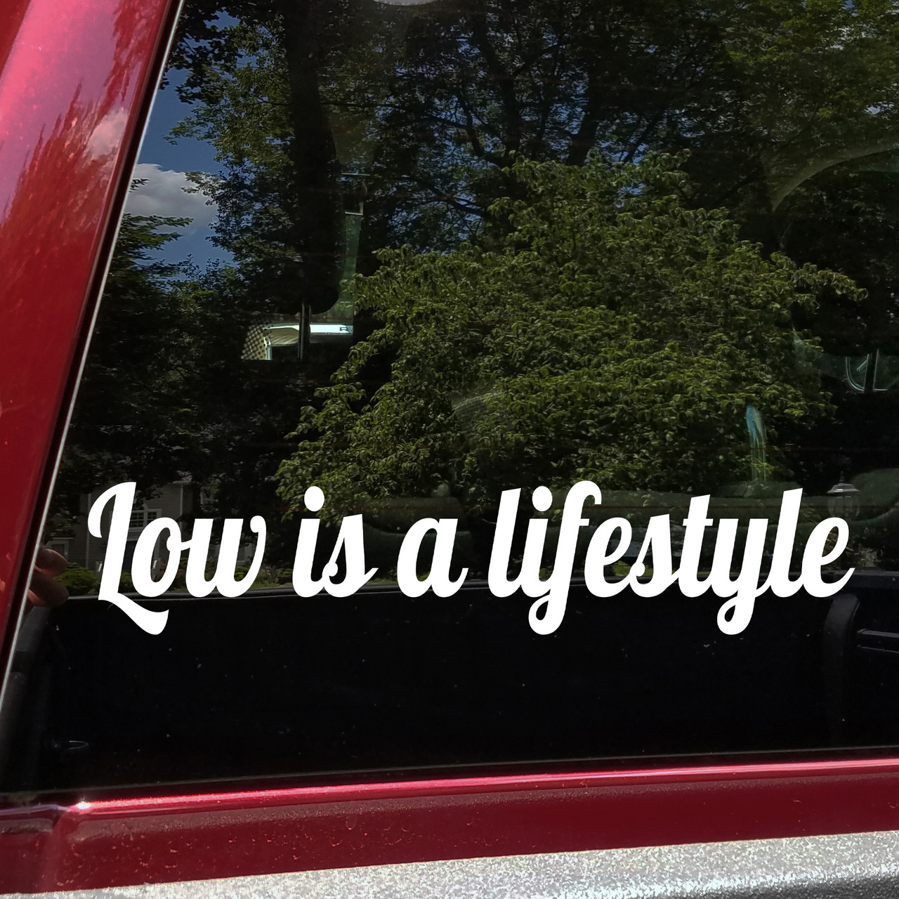 Low Is A Lifestyle vinyl decal featuring bold stance culture text celebrating lowered suspension and modified car builds
