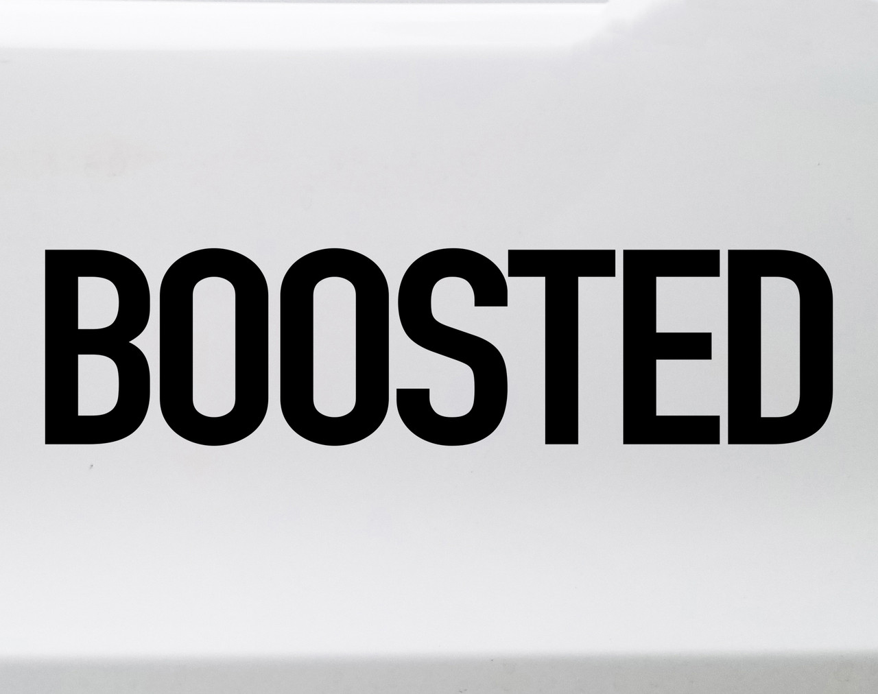 Boosted vinyl decal featuring bold performance lettering inspired by turbocharged and modified car culture on a white background